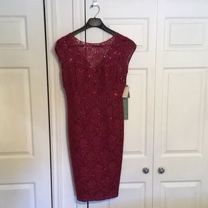 Women’s burgundy new with tags dress. Lace, sequins.